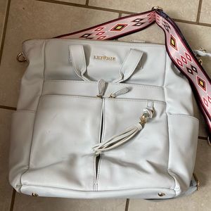 White vegan leather lily jade diaper bag.